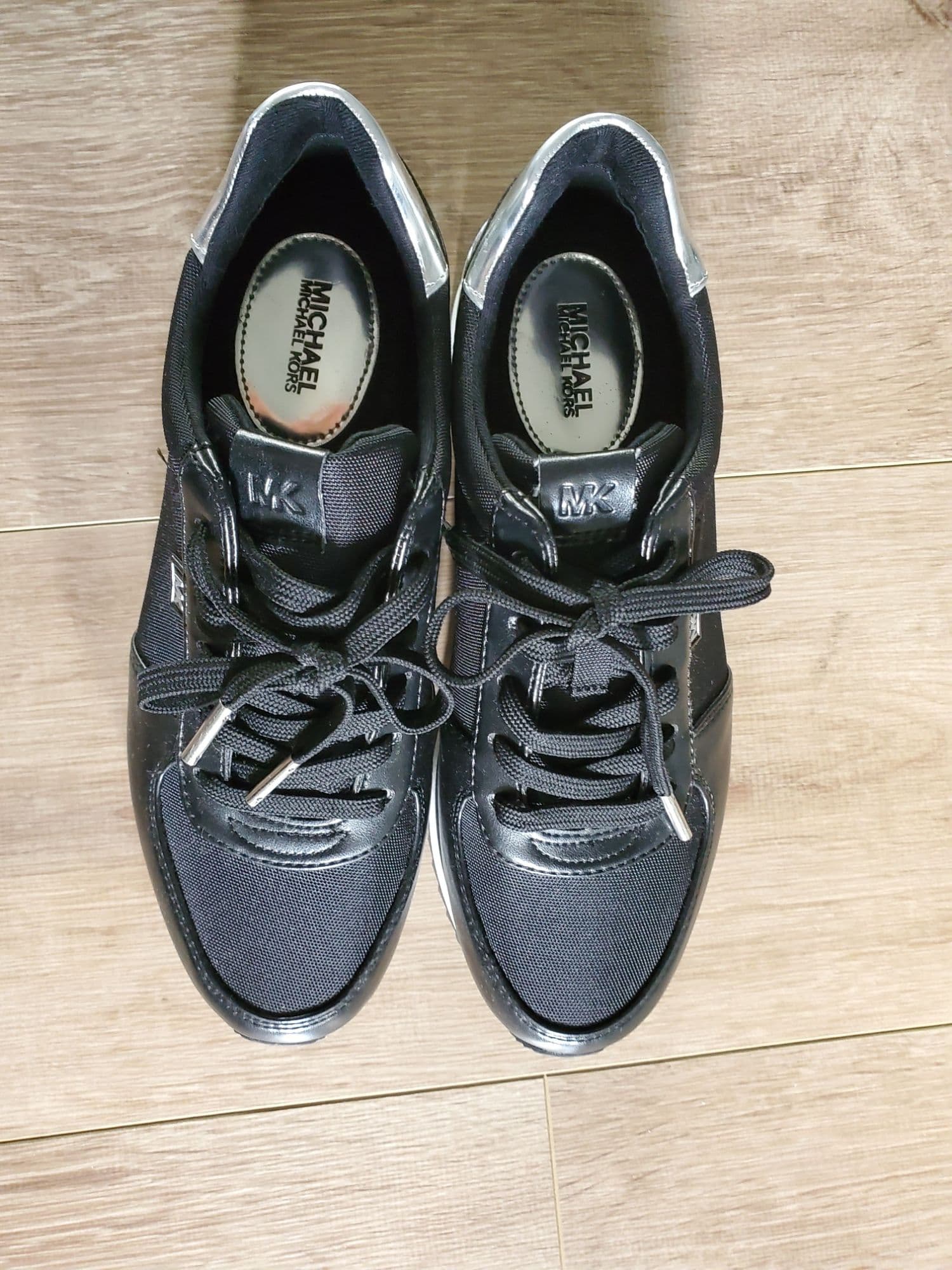 new! women size 7, Michael Kore sneaker - 1